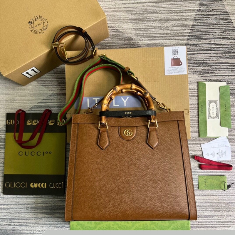 G*u*i top handle bags